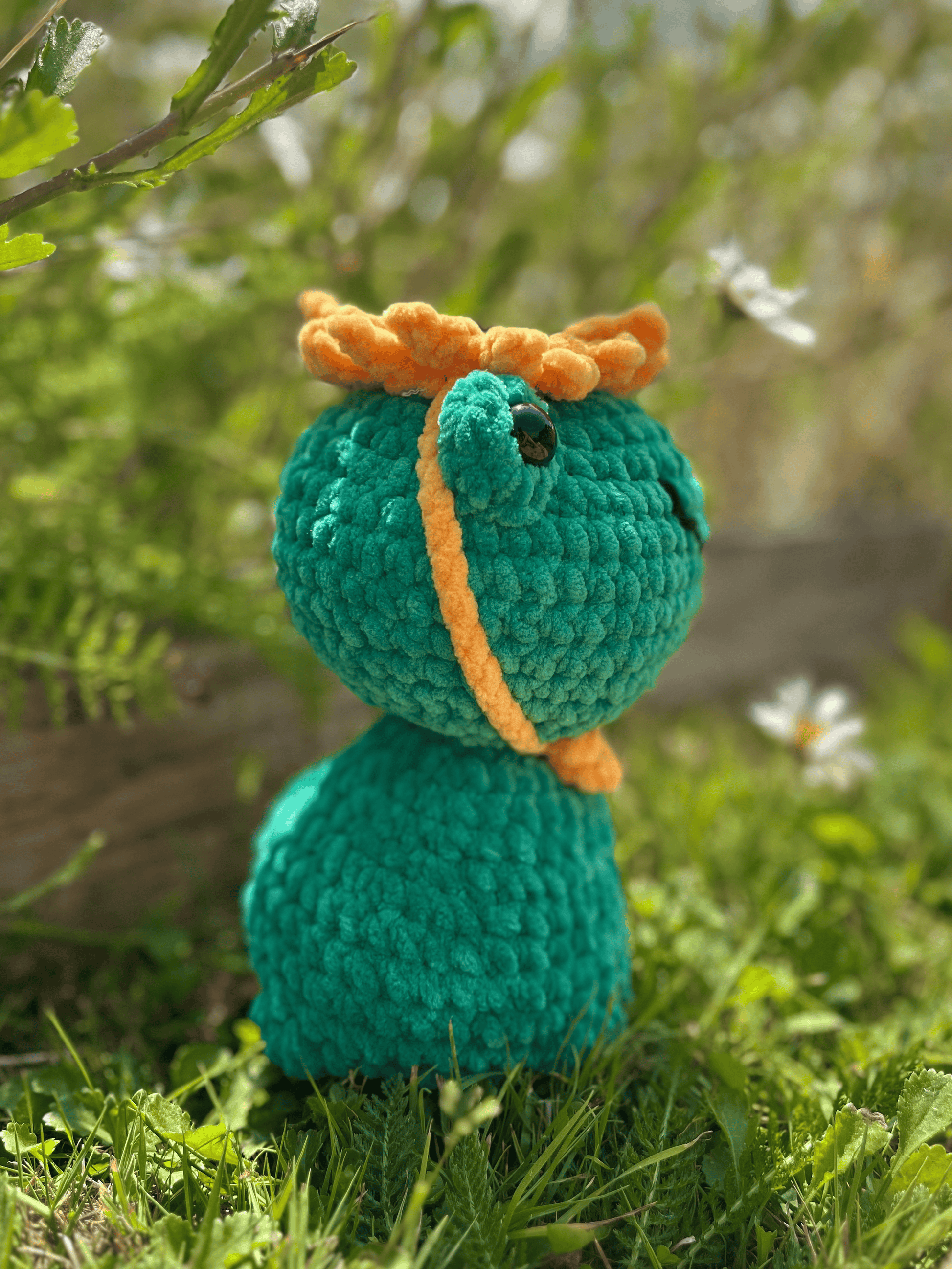Kermy the Frog crochet plushie wearing a sunhat, cute handmade frog toy and travel companion