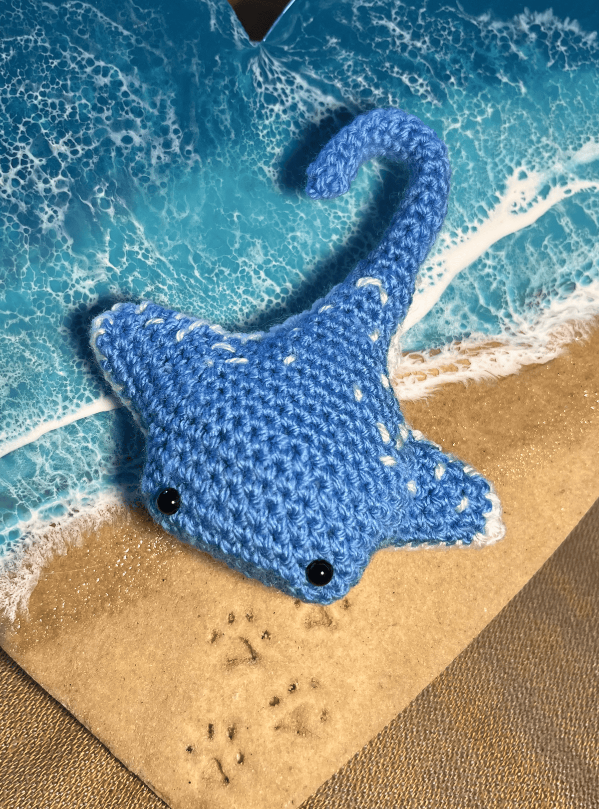 Crochet Bluespotted Ribbontail Ray keychain, handmade marine life accessory and ocean-themed bag charm