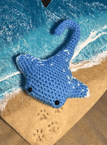 Crochet Bluespotted Ribbontail Ray keychain, handmade marine life accessory and ocean-themed bag charm