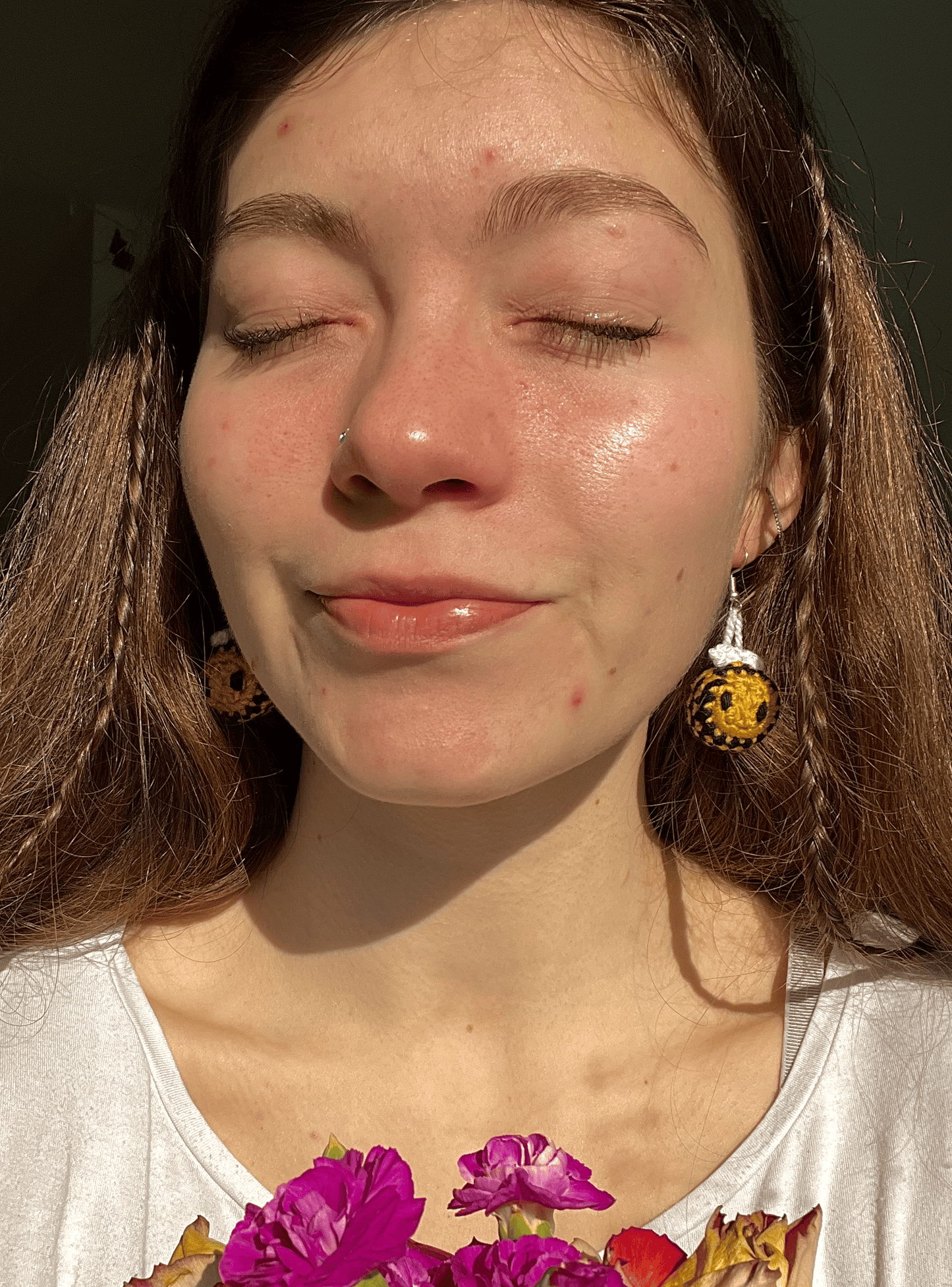 Handmade bumblebee crochet earrings worn as spring jewellery, cute nature-inspired accessories and cottagecore fashion