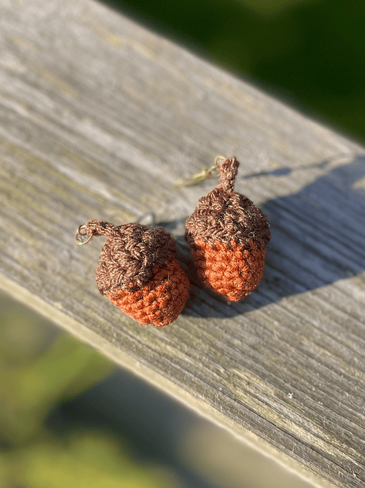 Handmade crochet acorn earrings in warm earthy colours, autumn nature jewellery