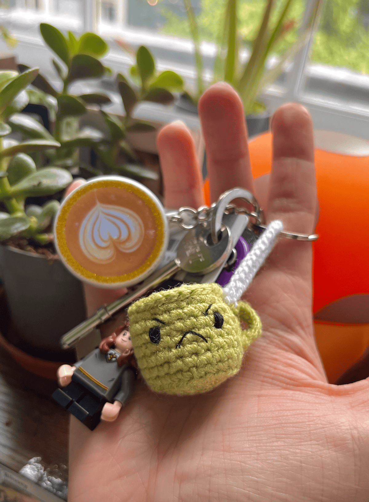 Handmade crochet coffee cup keychain with happy sleepy grumpy and jolly emoji expressions cute coffee bag charm handmade accessory UK