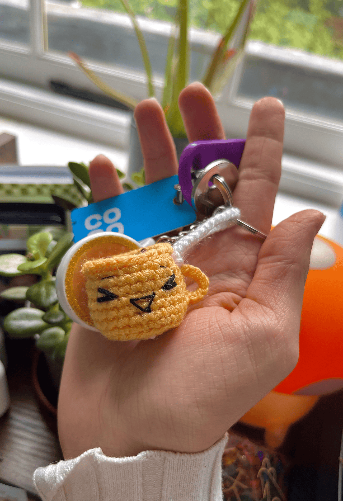 Handmade crochet coffee cup keychain with happy sleepy grumpy and jolly emoji expressions cute coffee bag charm handmade accessory UK