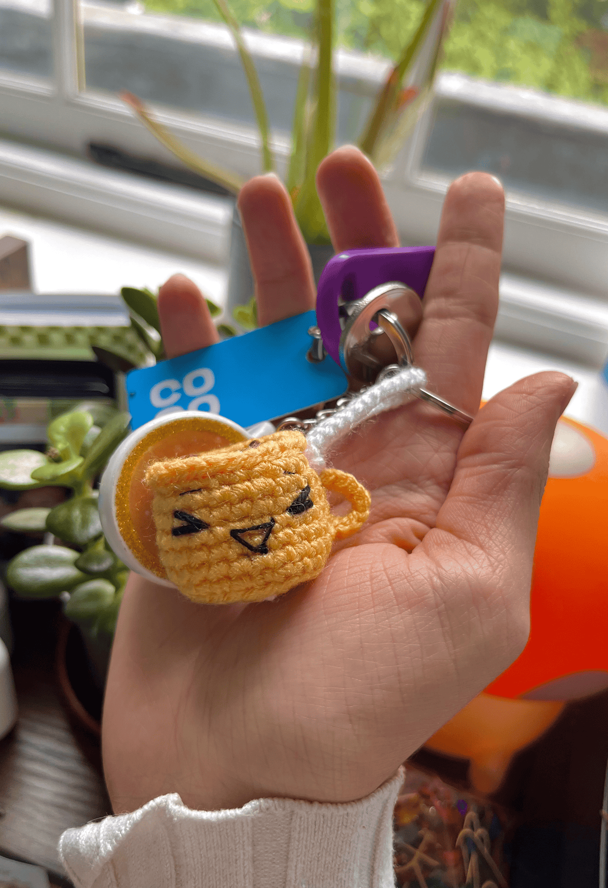 Handmade crochet coffee cup keychain with happy sleepy grumpy and jolly emoji expressions cute coffee bag charm handmade accessory UK