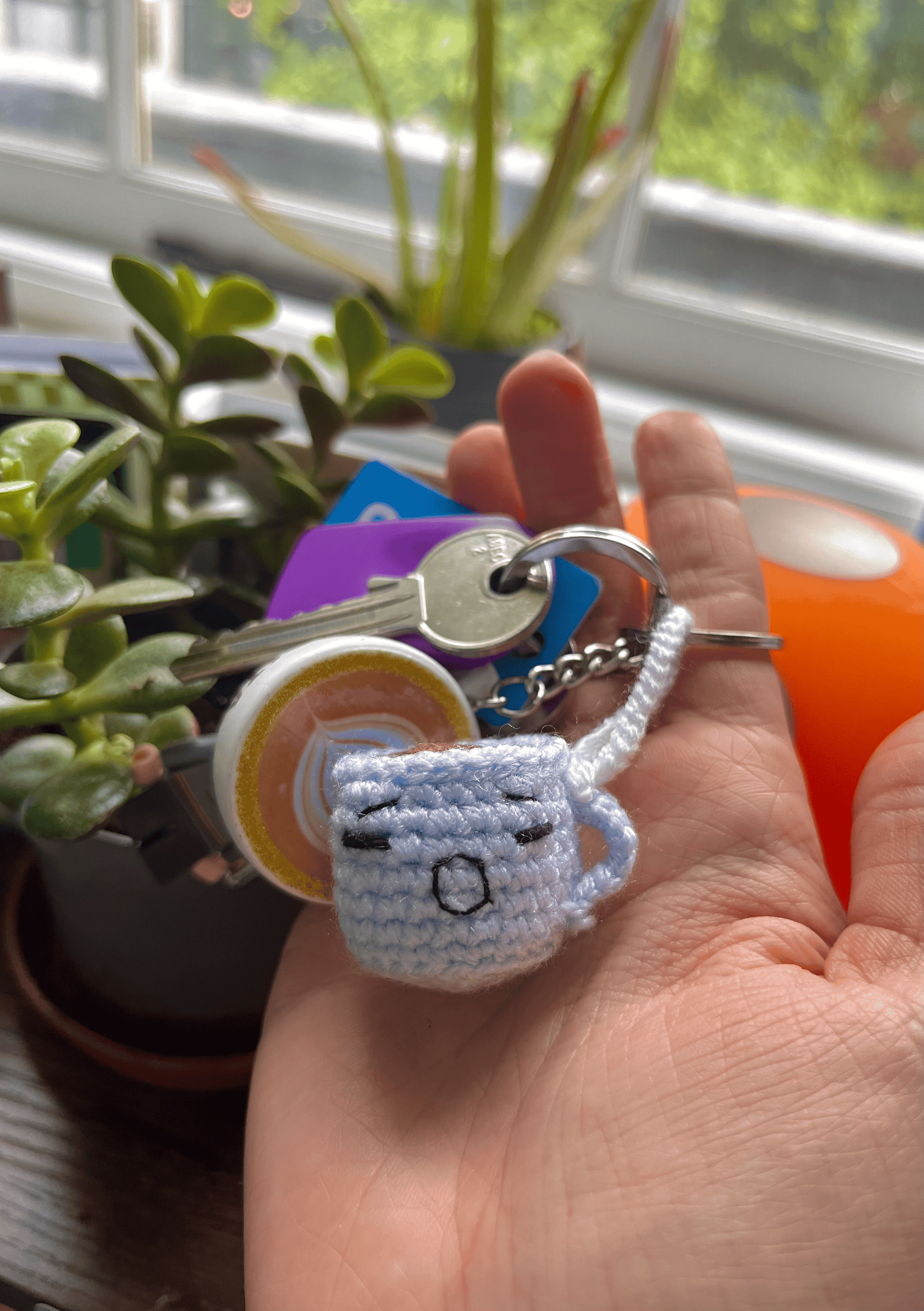 Handmade crochet coffee cup keychain with happy sleepy grumpy and jolly emoji expressions cute coffee bag charm handmade accessory UK