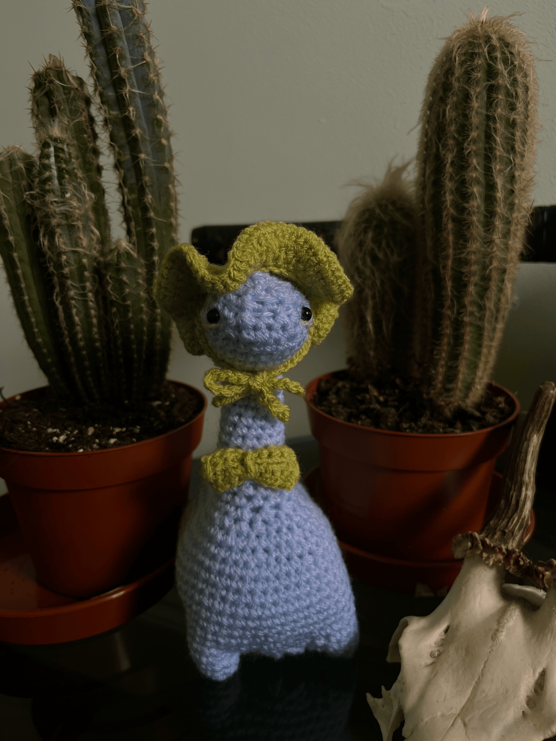 Handmade crochet dinosaur plush Seymour the Sauropod amigurumi dinosaur toy with bucket hat and bow tie UK