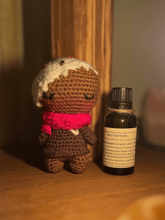 Hansel crochet gingerbread companion paired with Best Digestive Bitters festive herbal gift set