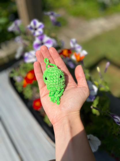 Green luminescent crochet jellyfish keychain and handmade sea creature accessory