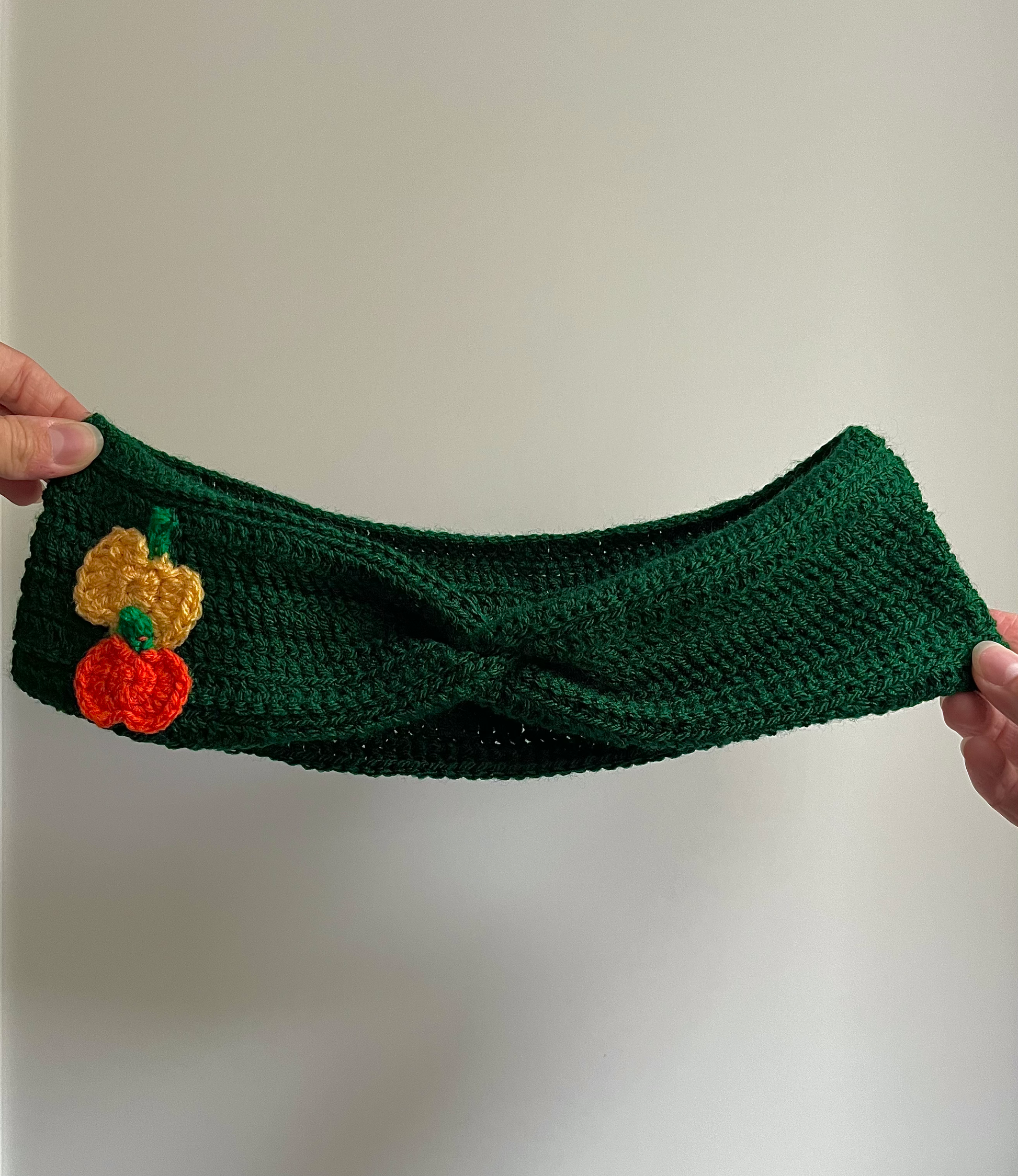 Handmade crochet pumpkin headwarmer, autumn and Halloween hair accessory with warm seasonal design