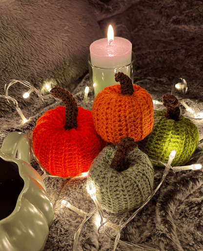 Handmade crochet pumpkin assortment for autumn and Halloween home decor, seasonal pumpkin decorations in warm colours