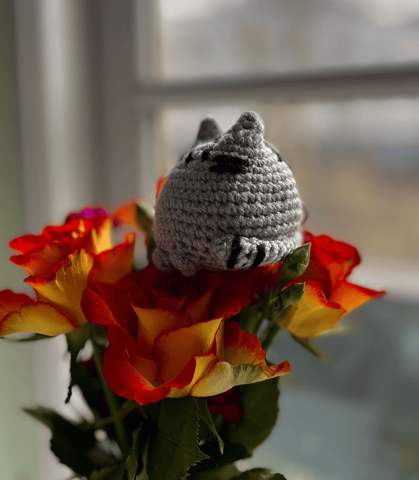 Crochet Pusheen cat keychain featuring handmade character design, cute kawaii accessory and Pusheen fan gift
