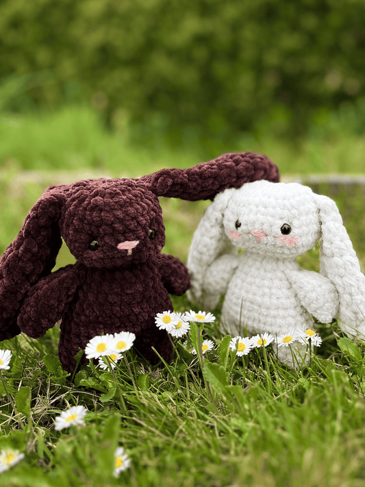 Snowdrop and Cocoa mini crochet Easter bunny plushies in white and chocolate brown, cute handmade rabbit toys
