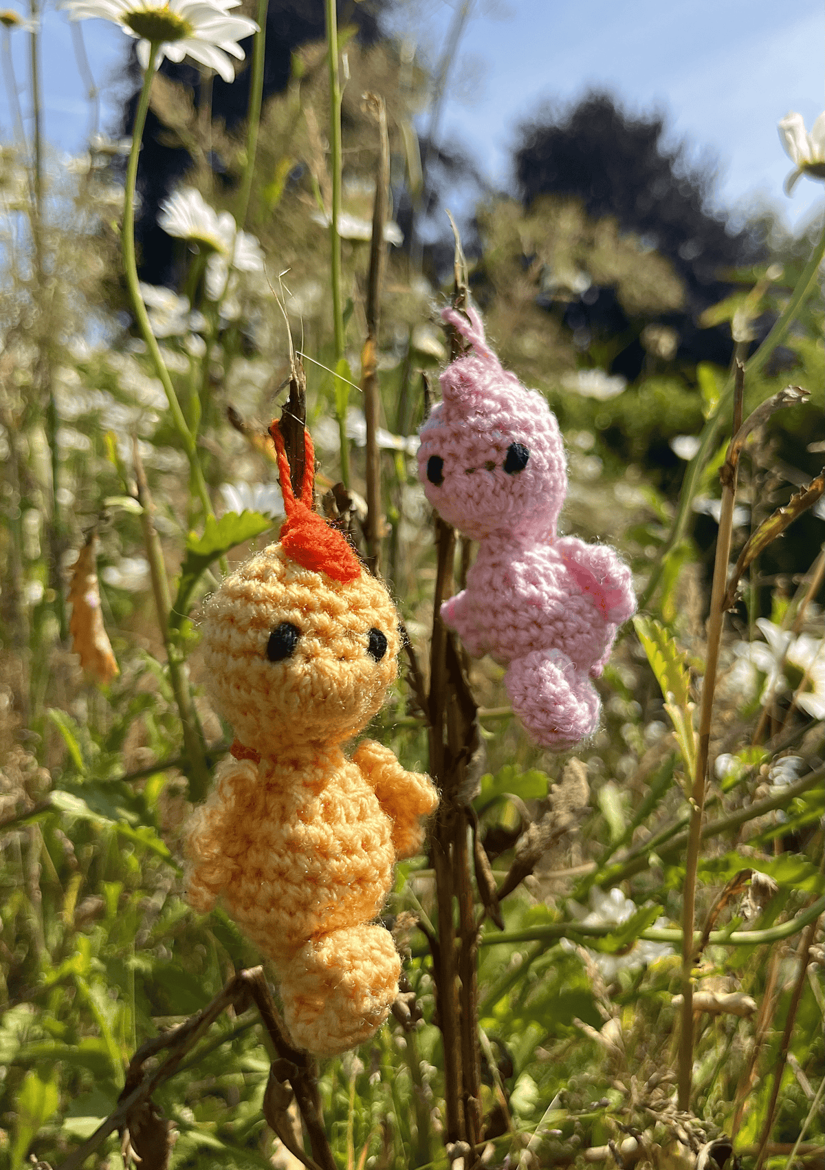 Crochet seahorse keychains featuring Pygmy Bargibanti and Orange Kuda seahorses, handmade ocean life accessories
