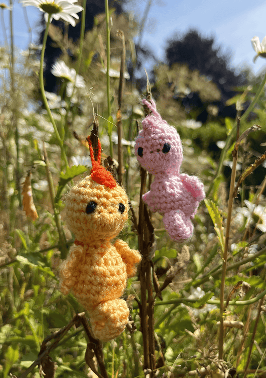 Crochet seahorse keychains featuring Pygmy Bargibanti and Orange Kuda seahorses, handmade ocean life accessories