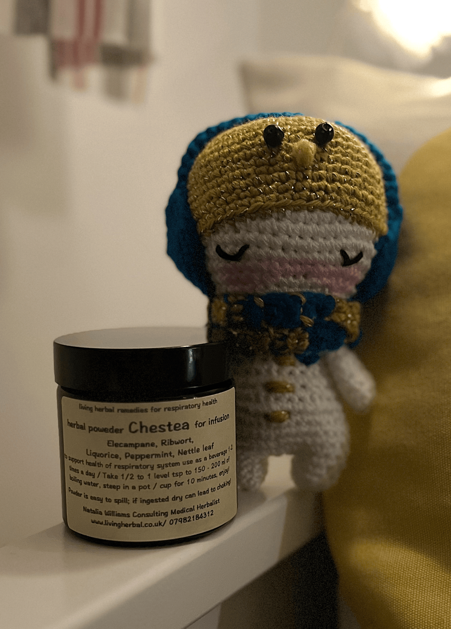 Olaf crochet snowman paired with Chestea herbal powder as a cosy winter gift set