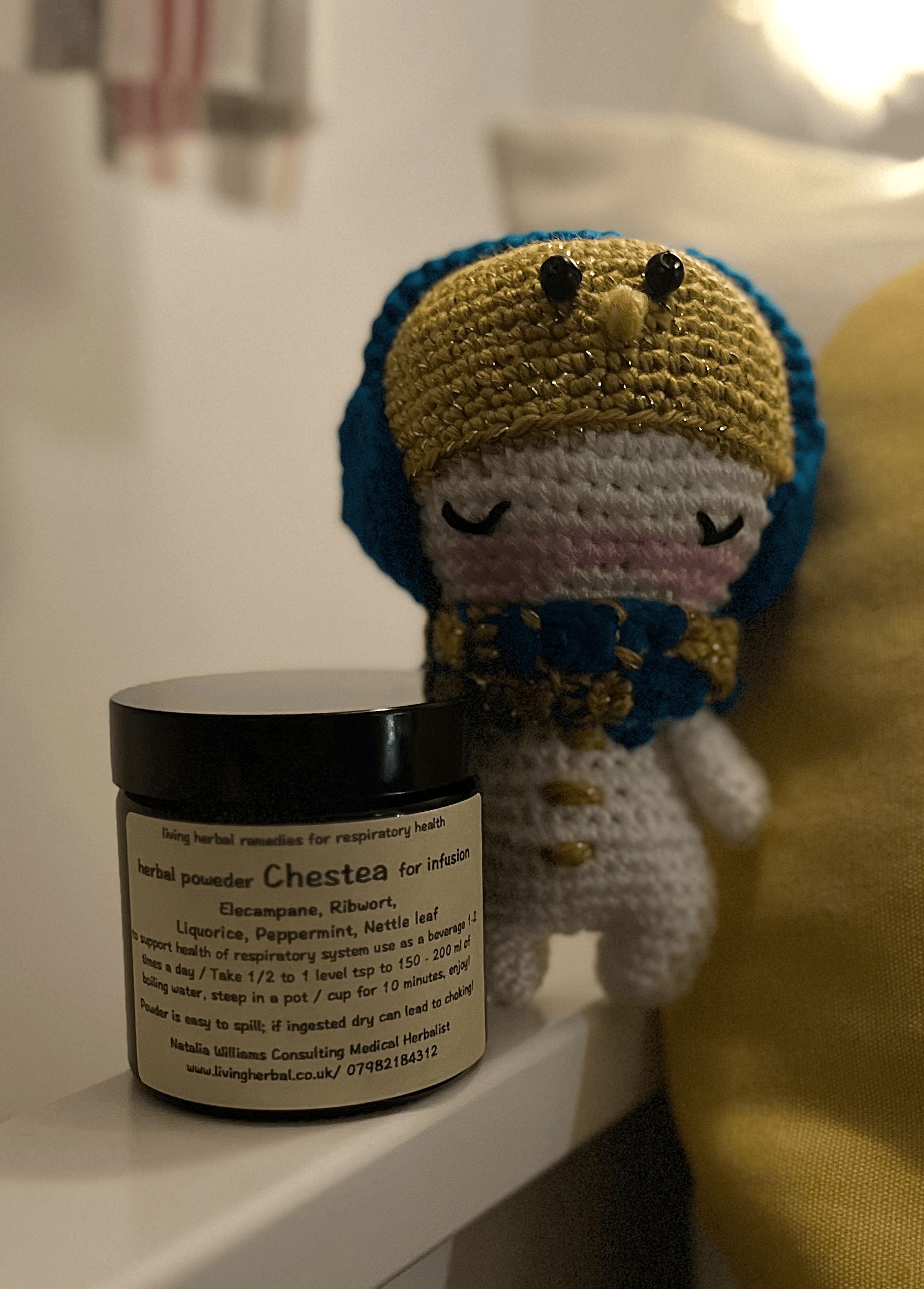 Olaf crochet snowman paired with Chestea herbal powder as a cosy winter gift set