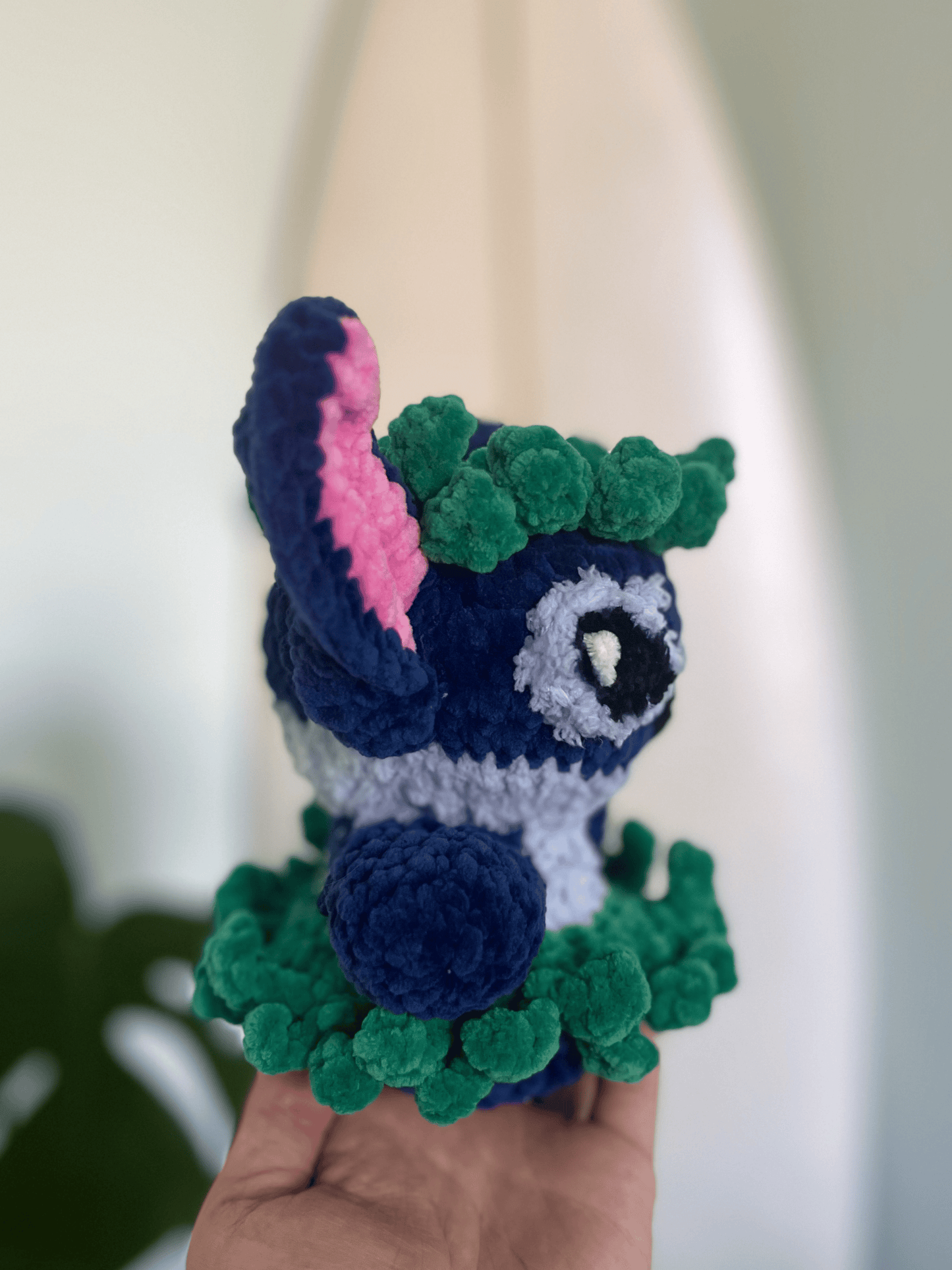 Blue Stitch crochet plush toy showing floppy ears and handmade amigurumi details