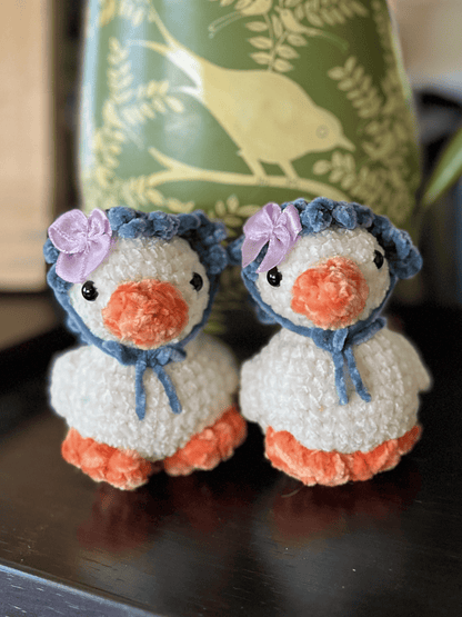 Small chenille crochet duckling plush with handmade bandana for spring and Easter