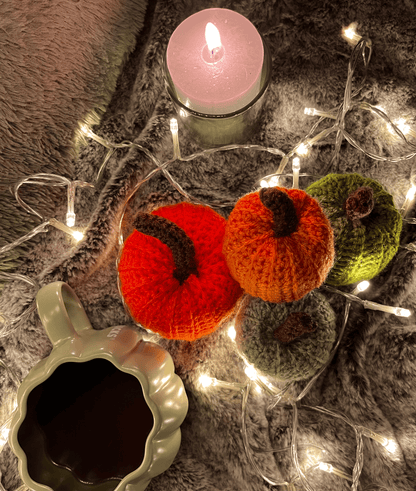 Handmade crochet pumpkin assortment for autumn and Halloween home decor, seasonal pumpkin decorations in warm colours