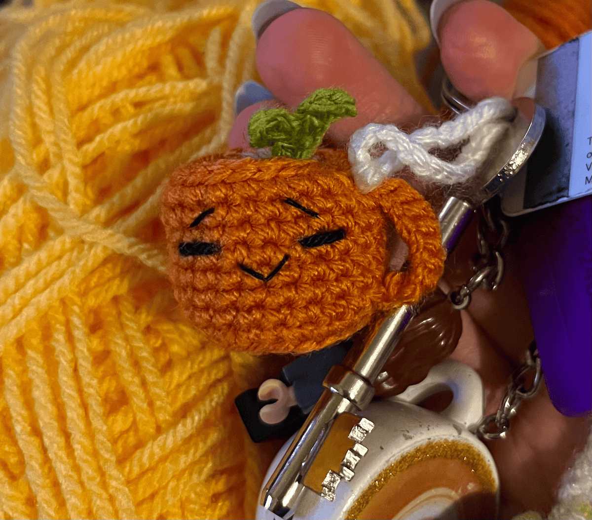 Handmade crochet emoji pumpkin coffee cup keychain, cute Halloween accessory, autumn coffee bag charm and pumpkin keyring