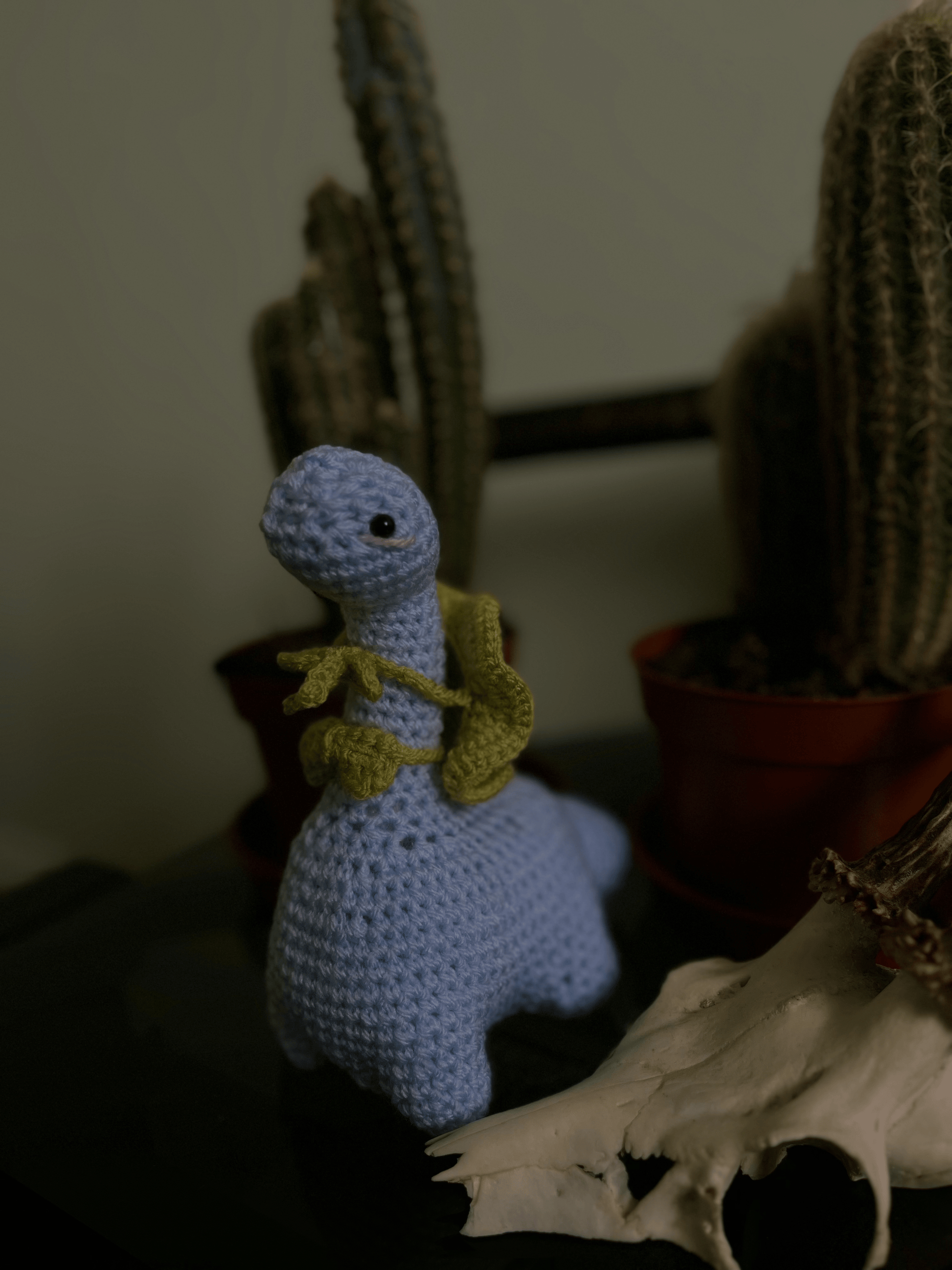 Handmade crochet dinosaur plush Seymour the Sauropod amigurumi dinosaur toy with bucket hat and bow tie UK