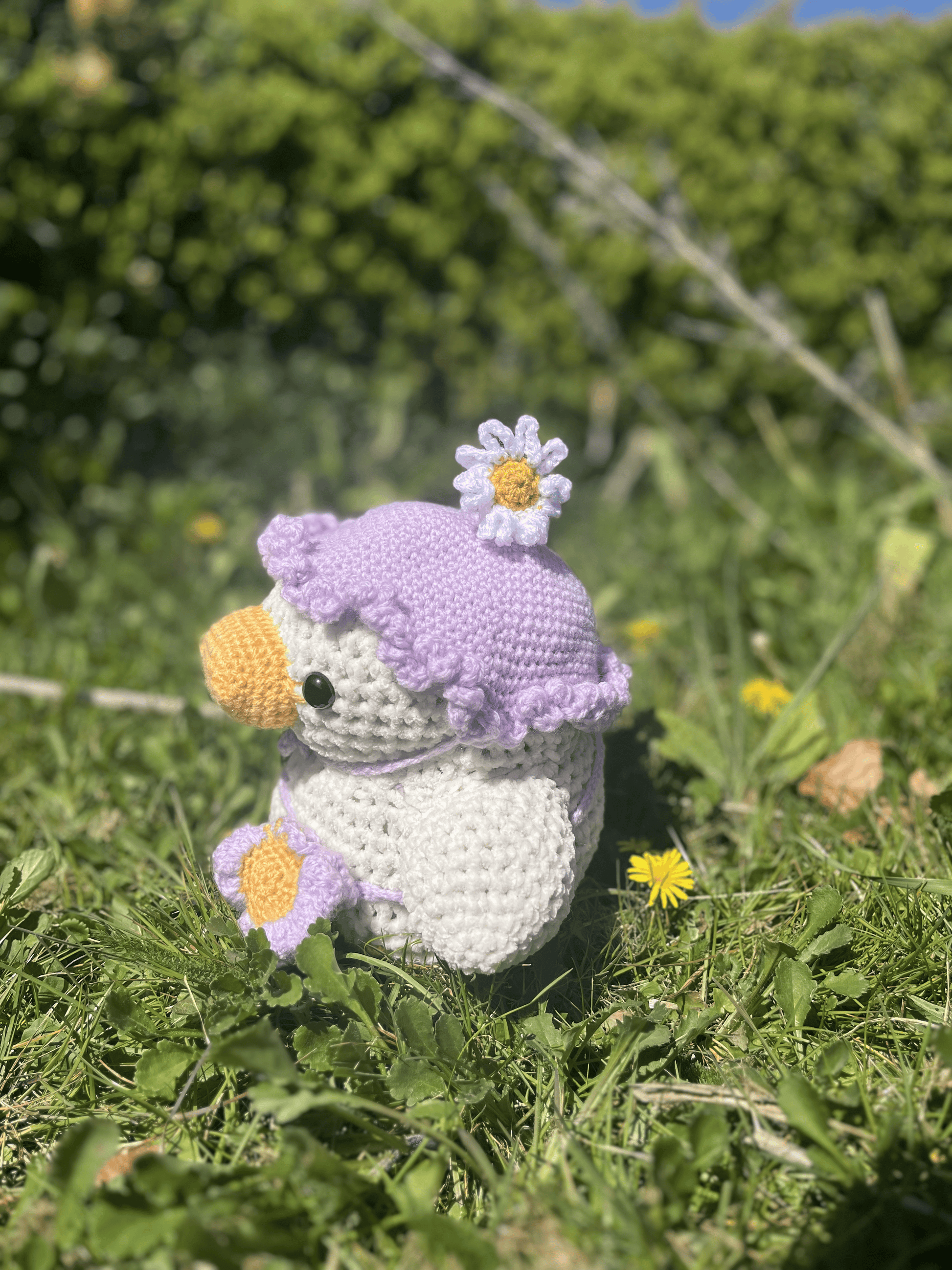 Handmade crochet duckling plush with removable floral hat and miniature satchel, Easter crochet toy and cute animal keepsake