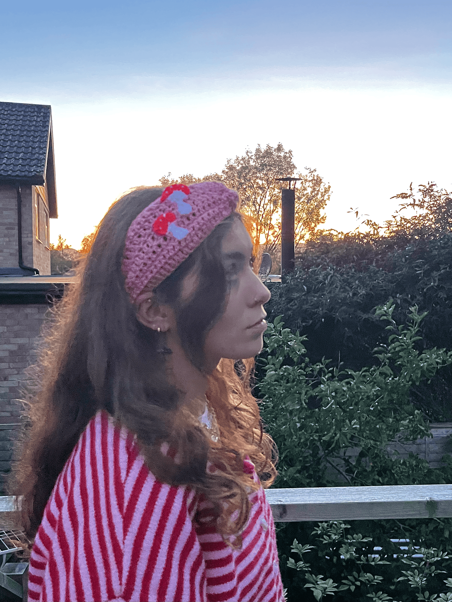Mushroom crochet headwarmer and wrist warmers worn as cosy autumn accessories