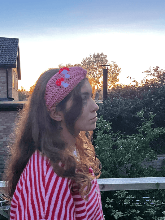 Mushroom crochet headwarmer and wrist warmers worn as cosy autumn accessories