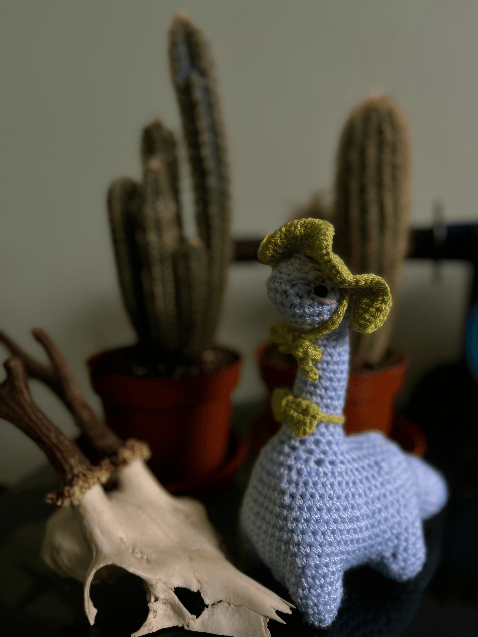 Handmade crochet dinosaur plush Seymour the Sauropod amigurumi dinosaur toy with bucket hat and bow tie UK