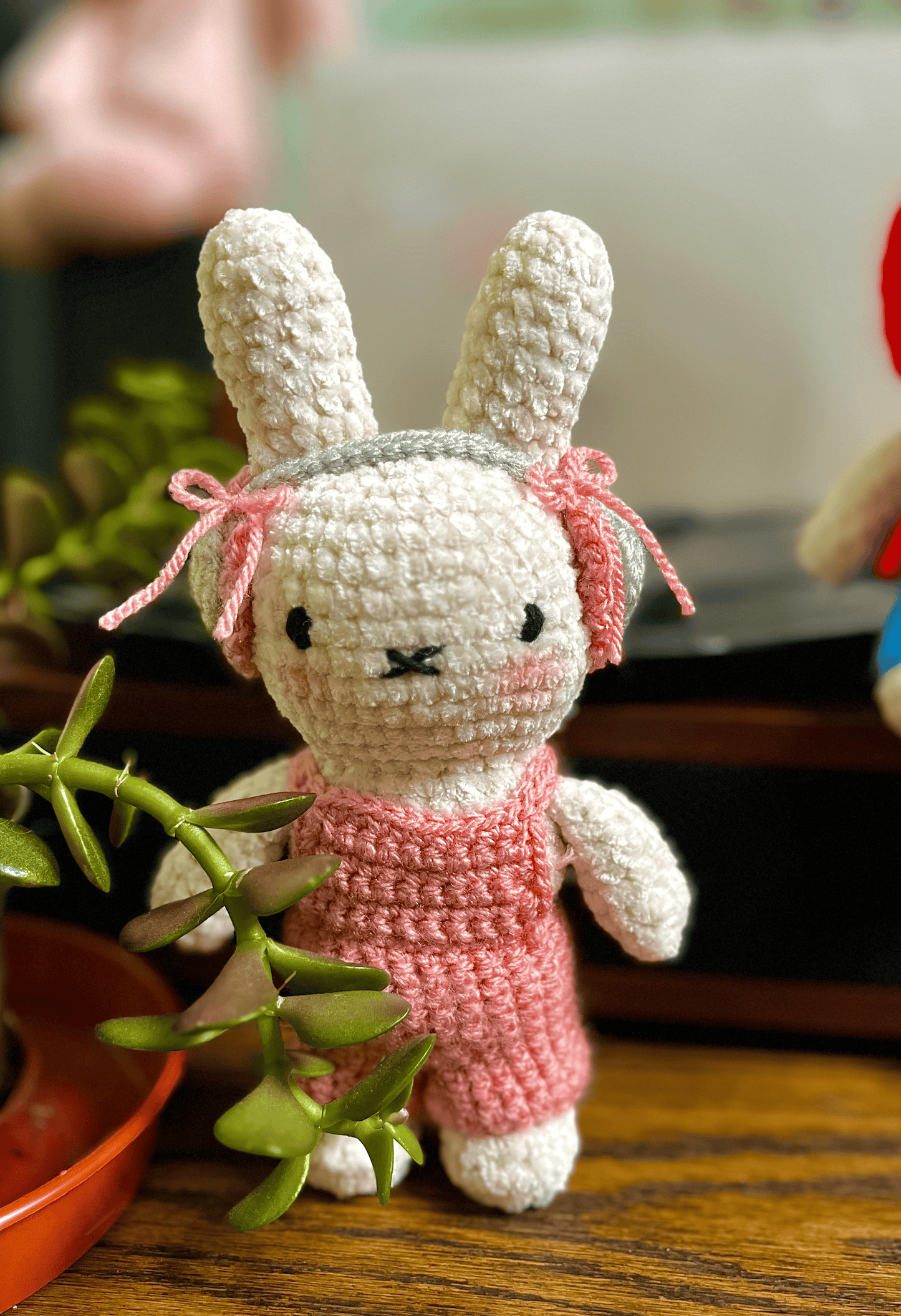 Handmade Crochet Miffy plush in pink dungarees with cosy headphones, cute Miffy collectible and handmade character toy