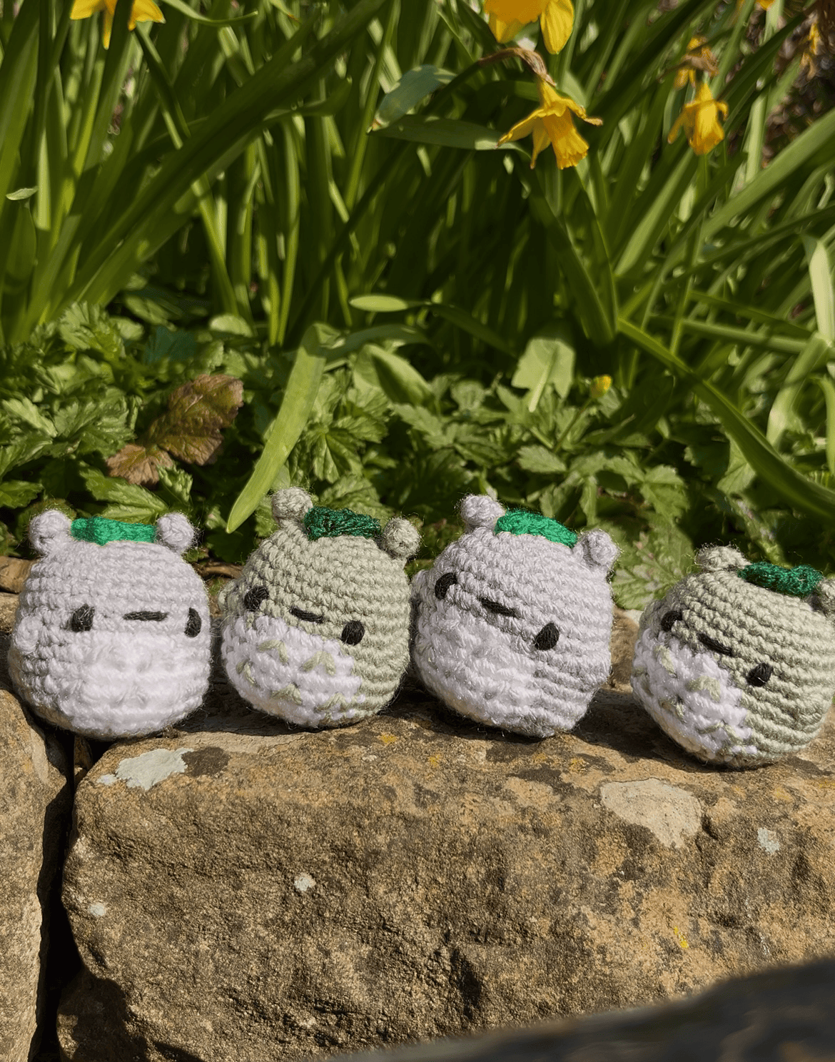 Mini Totoro crochet keychains in sage green and grey, handmade My Neighbour Totoro accessories and Studio Ghibli inspired keyrings
