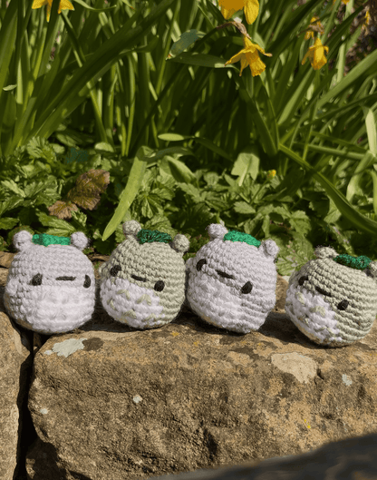 Mini Totoro crochet keychains in sage green and grey, handmade My Neighbour Totoro accessories and Studio Ghibli inspired keyrings