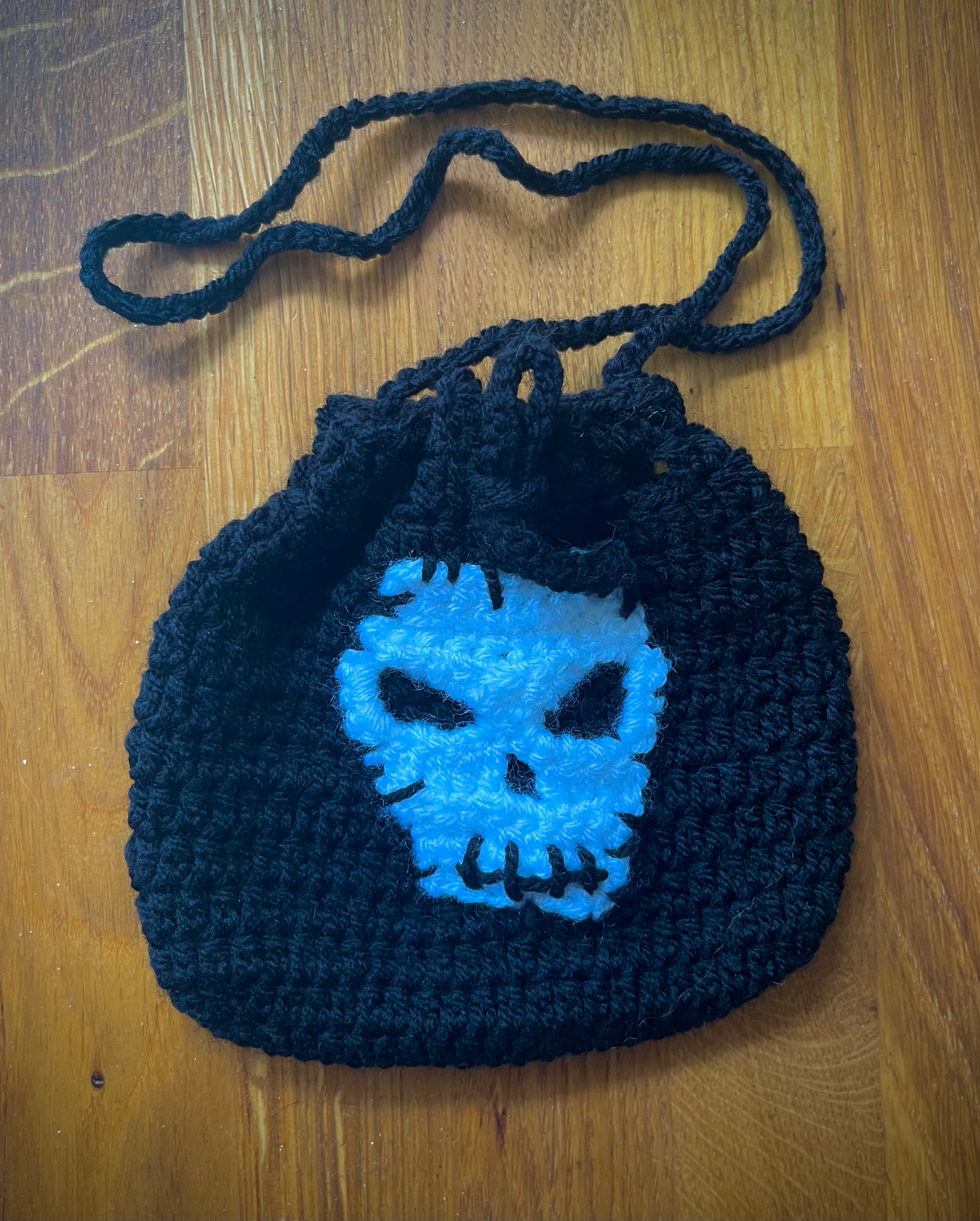 Crochet Halloween pouch designed for trick or treating, sweets, candy and seasonal Halloween accessories